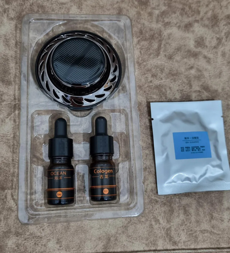 خوشبوکننده خورشیدی ماشین اورجینال JIN GE مدل JG-009 | ۱۸ پره چرخان + ۵۴ منفذ پخش عطر + بدون برق و باتری + عمر مفید ۲ سال | مناسب داشبورد